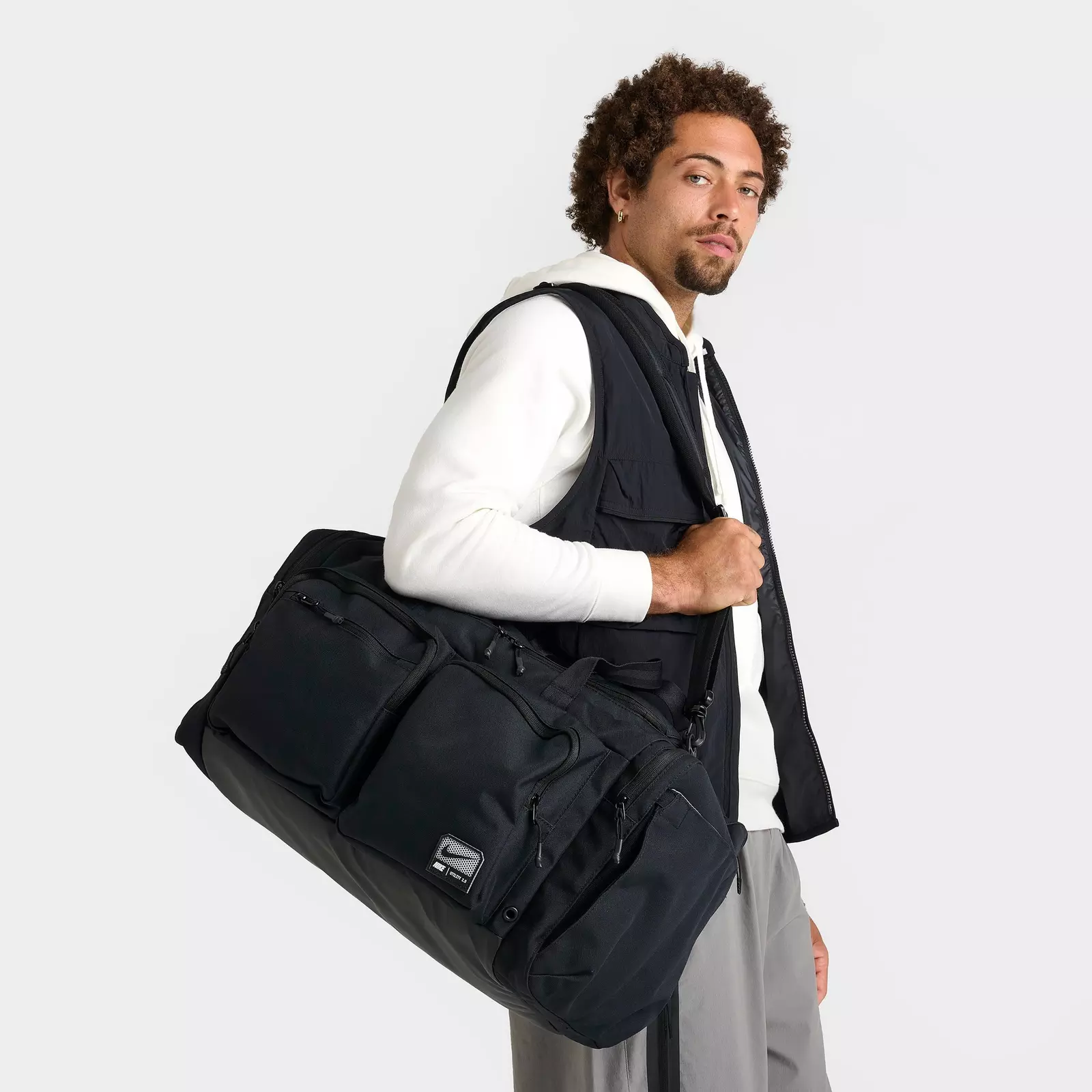 nike backpack duffle bag Team Training Max Air Duffel Black The Nike Brasilia 9.5 sports bag is the perfect companion for all your athletic endeavors Black Men's Large/Extra Large Nike