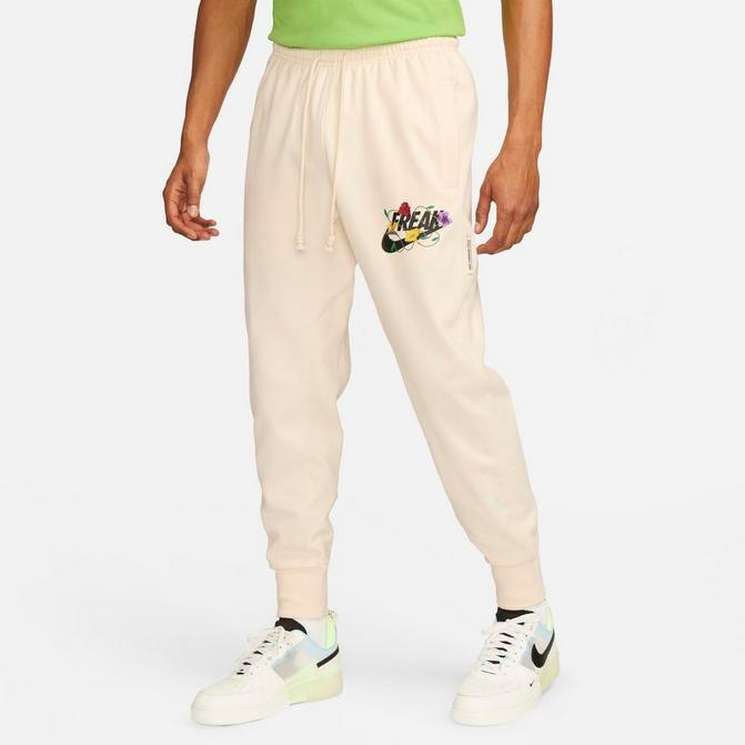 Nike Dri-FIT Standard Issue Men's Cuffed Basketball Pants. Nike.com