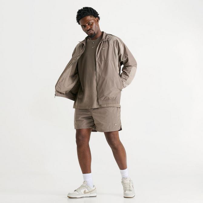 [angle] view of Nike NOCTA Northstar Nylon Track Jacket in Olive Grey/Moon Fossil/Moon Fossil Click to zoom