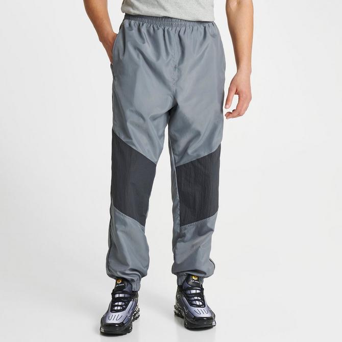 mens nike swishy pants