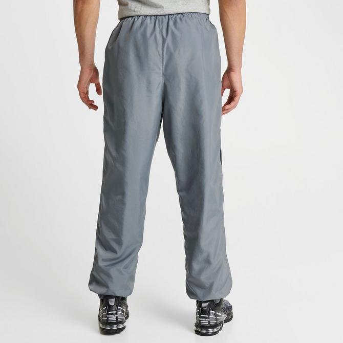 Nike Swoosh woven parachute sweatpants in earth brown