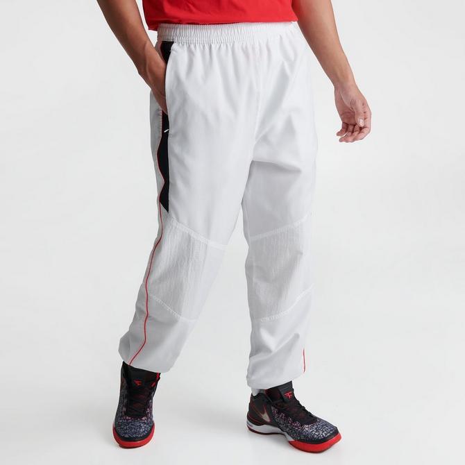 Nike sb swoosh track best sale pants white