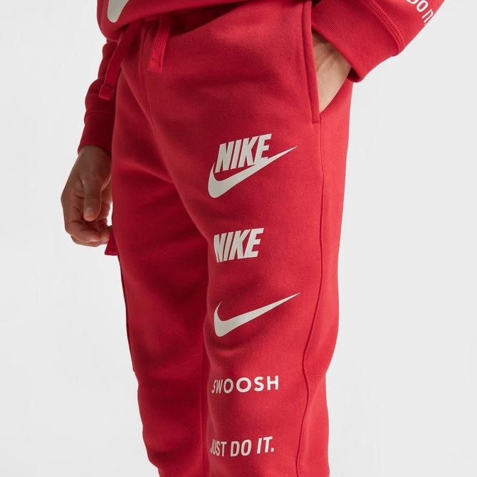 Red nike 2024 tick joggers