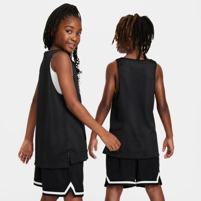 [angle] view of Kids' Nike Culture Of Basketball Reversible Jersey in Black/Black/White Click to zoom