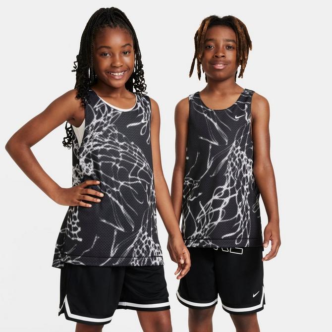 [angle] view of Kids' Nike Culture Of Basketball Reversible Jersey in Black/Black/White Click to zoom
