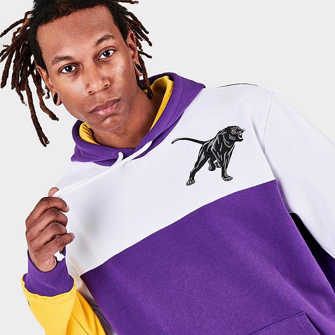 On Model 5 view of Men's Mitchell & Ness Prairie View A&M Panthers College Colorblock Hoodie in Purple/White/Yellow Click to zoom
