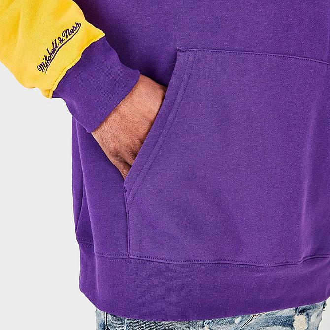 On Model 6 view of Men's Mitchell & Ness Prairie View A&M Panthers College Colorblock Hoodie in Purple/White/Yellow Click to zoom
