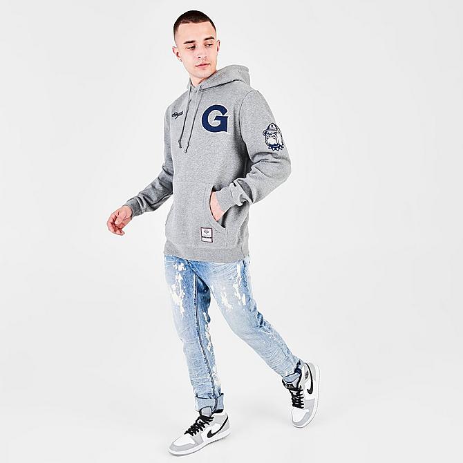Front Three Quarter view of Men's Mitchell & Ness Georgetown Hoyas College Champs Hoodie in Grey Click to zoom