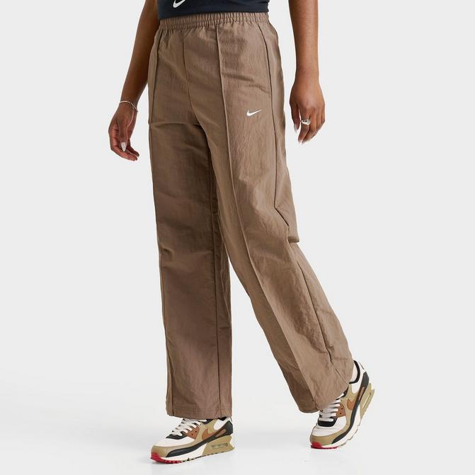 [angle] view of Women's Nike Sportswear Everything Wovens Mid-Rise Open-Hem Pants in Mink Brown/White Click to zoom