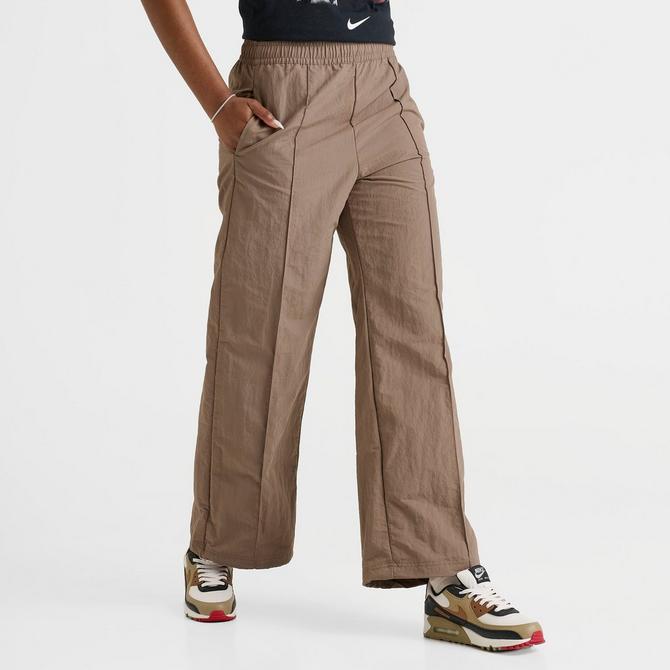 [angle] view of Women's Nike Sportswear Everything Wovens Mid-Rise Open-Hem Pants in Mink Brown/White Click to zoom