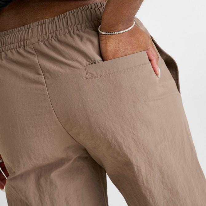 [angle] view of Women's Nike Sportswear Everything Wovens Mid-Rise Open-Hem Pants in Mink Brown/White Click to zoom