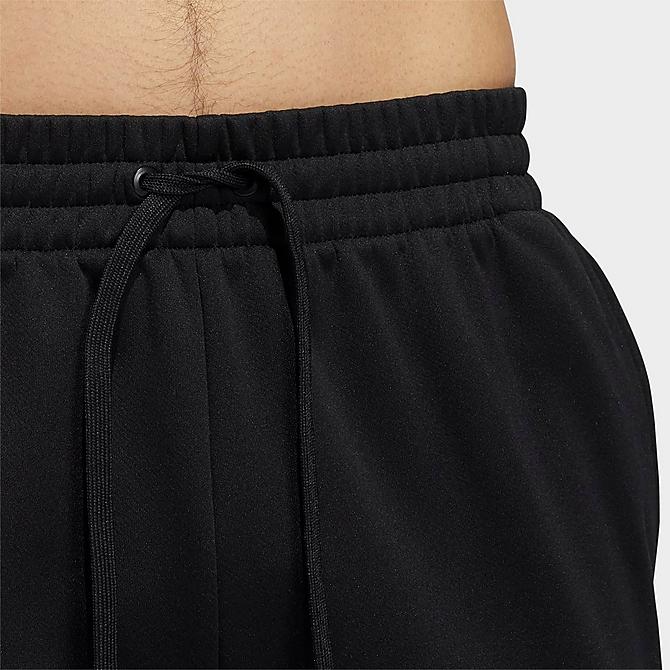On Model 5 view of Men's adidas Team Issue Sweatpants in Black Click to zoom