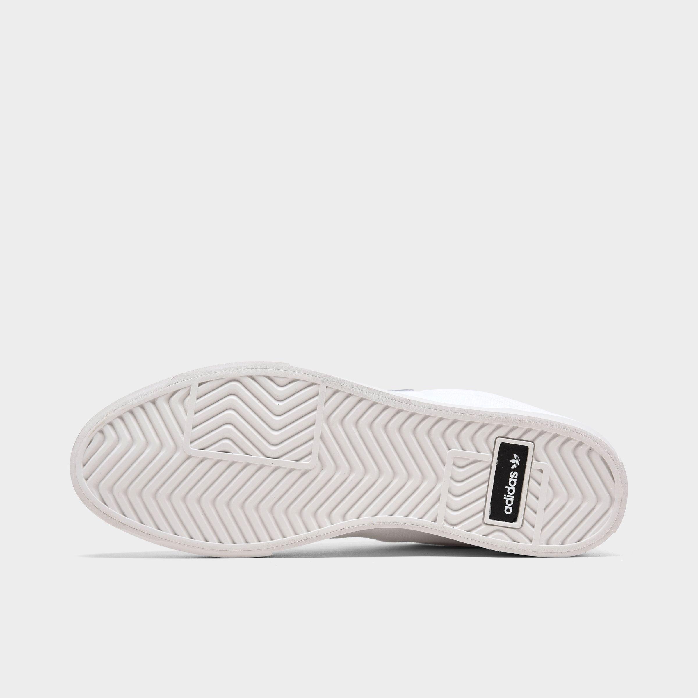 white adidas canvas trainers
