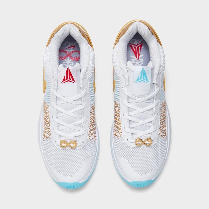 White and gold outlet nike basketball shoes