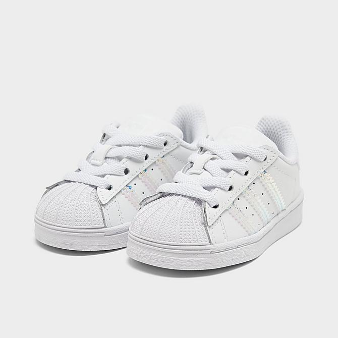 Three Quarter view of Girls' Toddler adidas Originals Superstar Casual Shoes in Cloud White/Cloud White-Iridescent Click to zoom