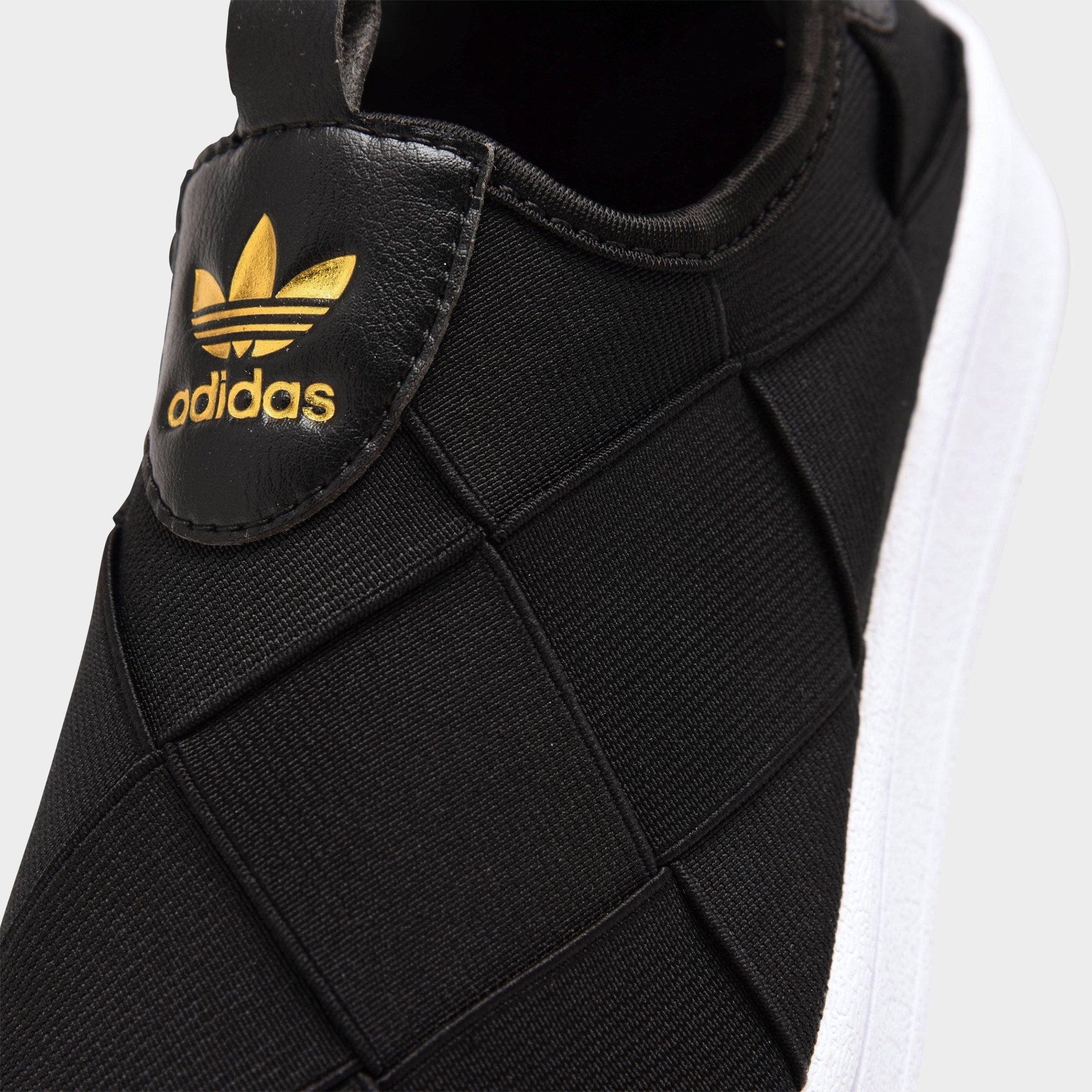 adidas originals superstar slip on sneakers in black and white