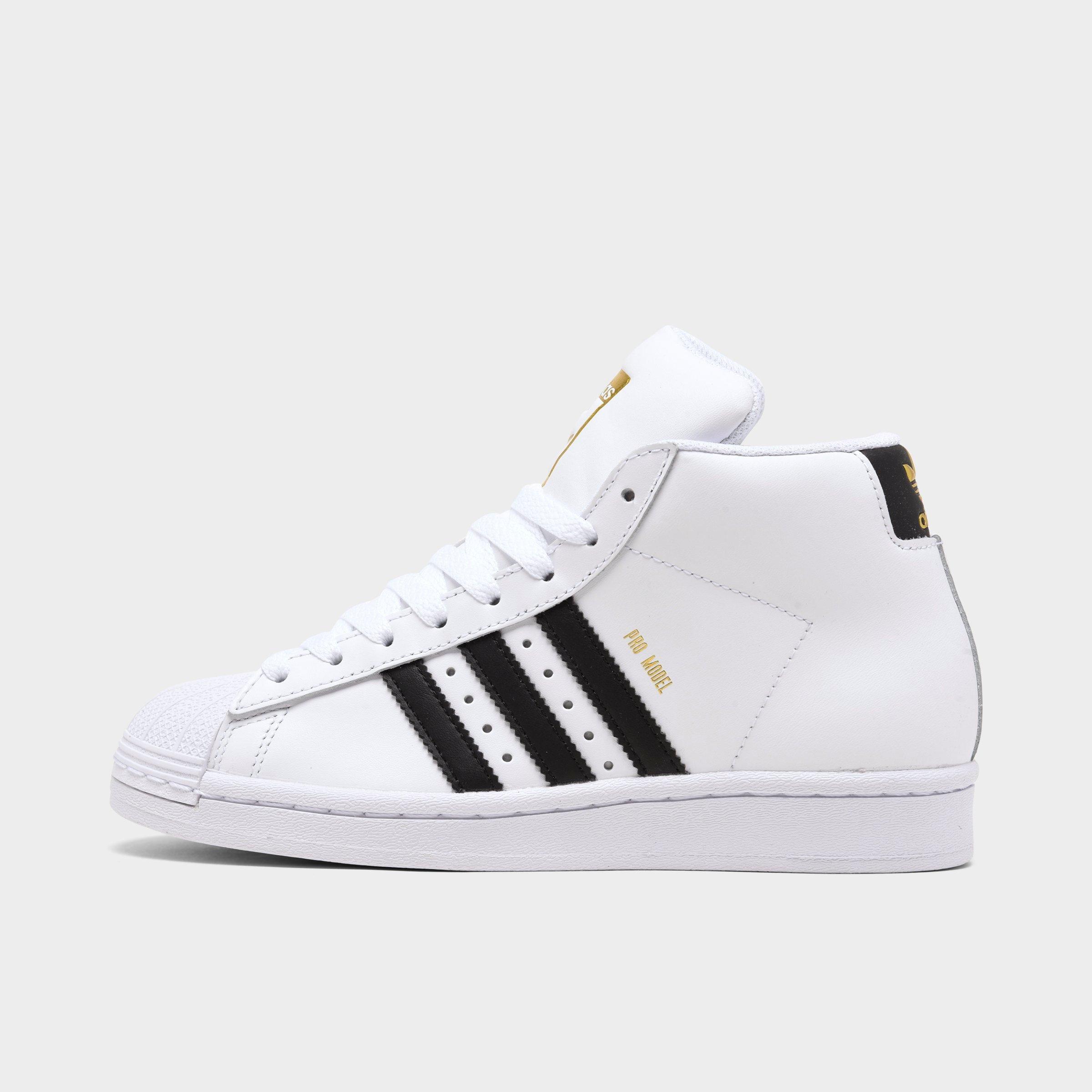 big kids white adidas