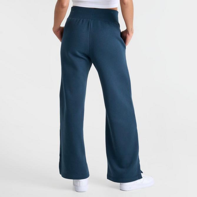 [angle] view of Women's Nike Sportswear Phoenix Fleece High-Waisted Wide-Leg Logo Pants in Jade Horizon Click to zoom