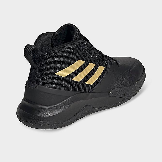 Left view of adidas OwnTheGame Basketball Shoes in Core Black/Matte Gold/Core Black Click to zoom