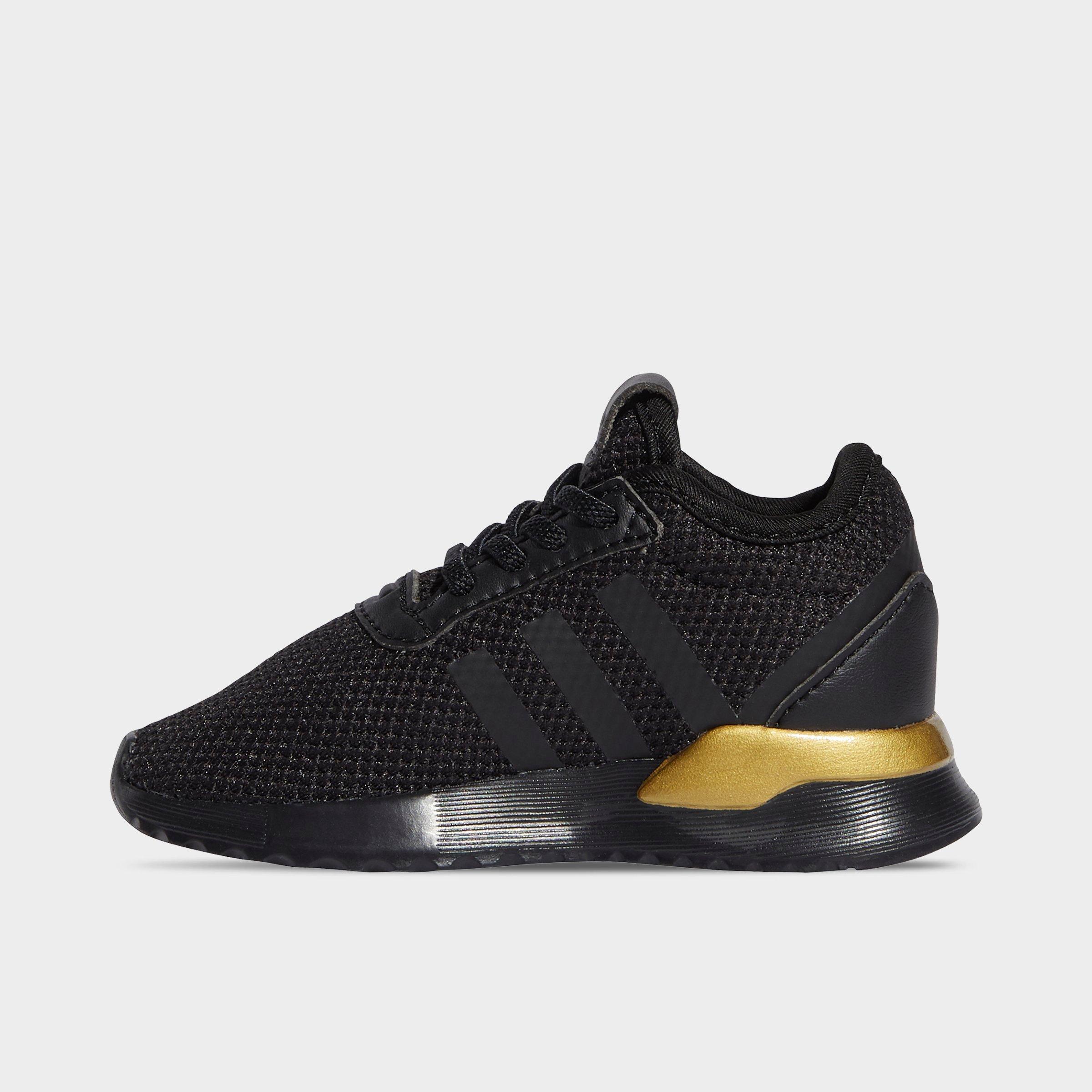 boys black and gold shoes