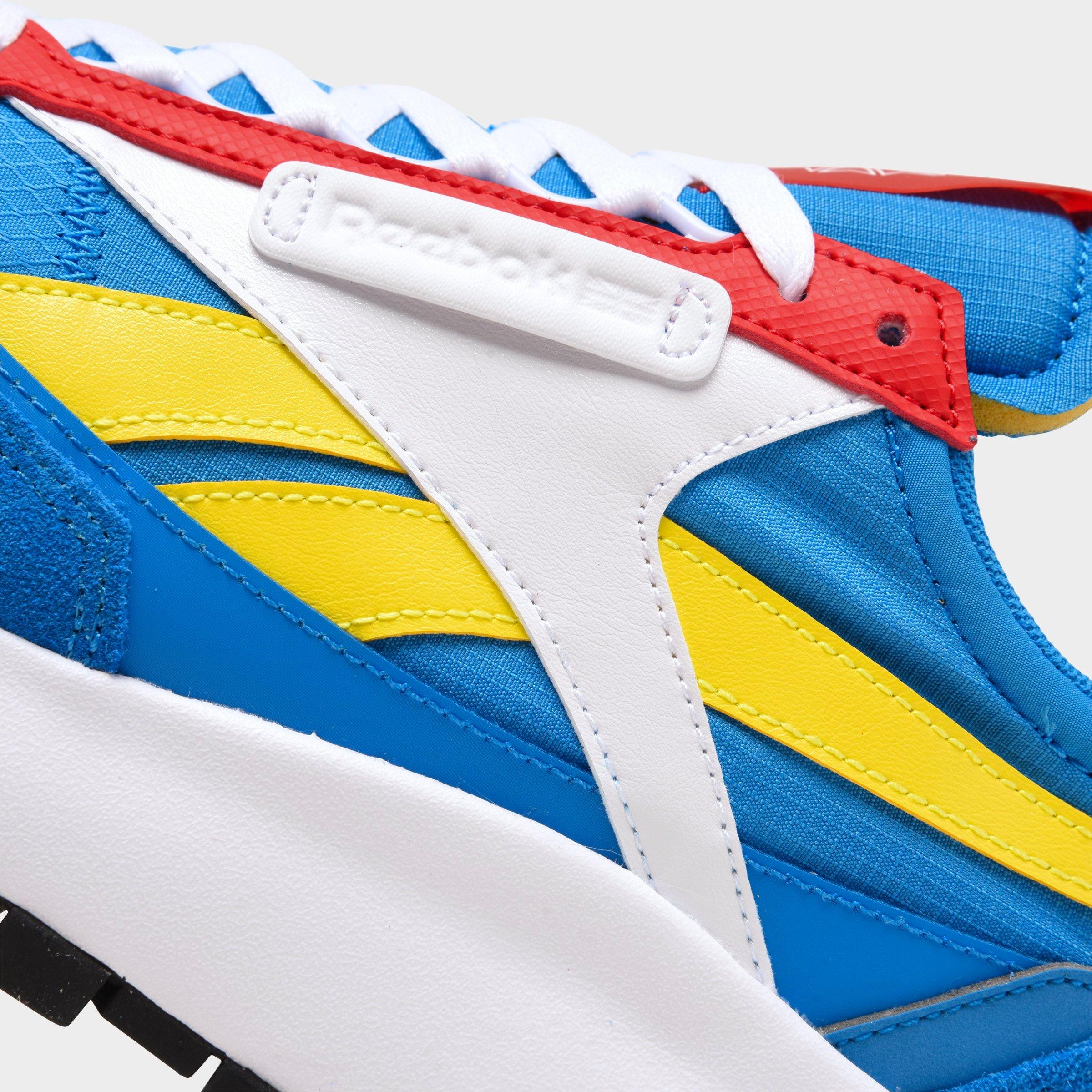 blue and yellow reebok classic
