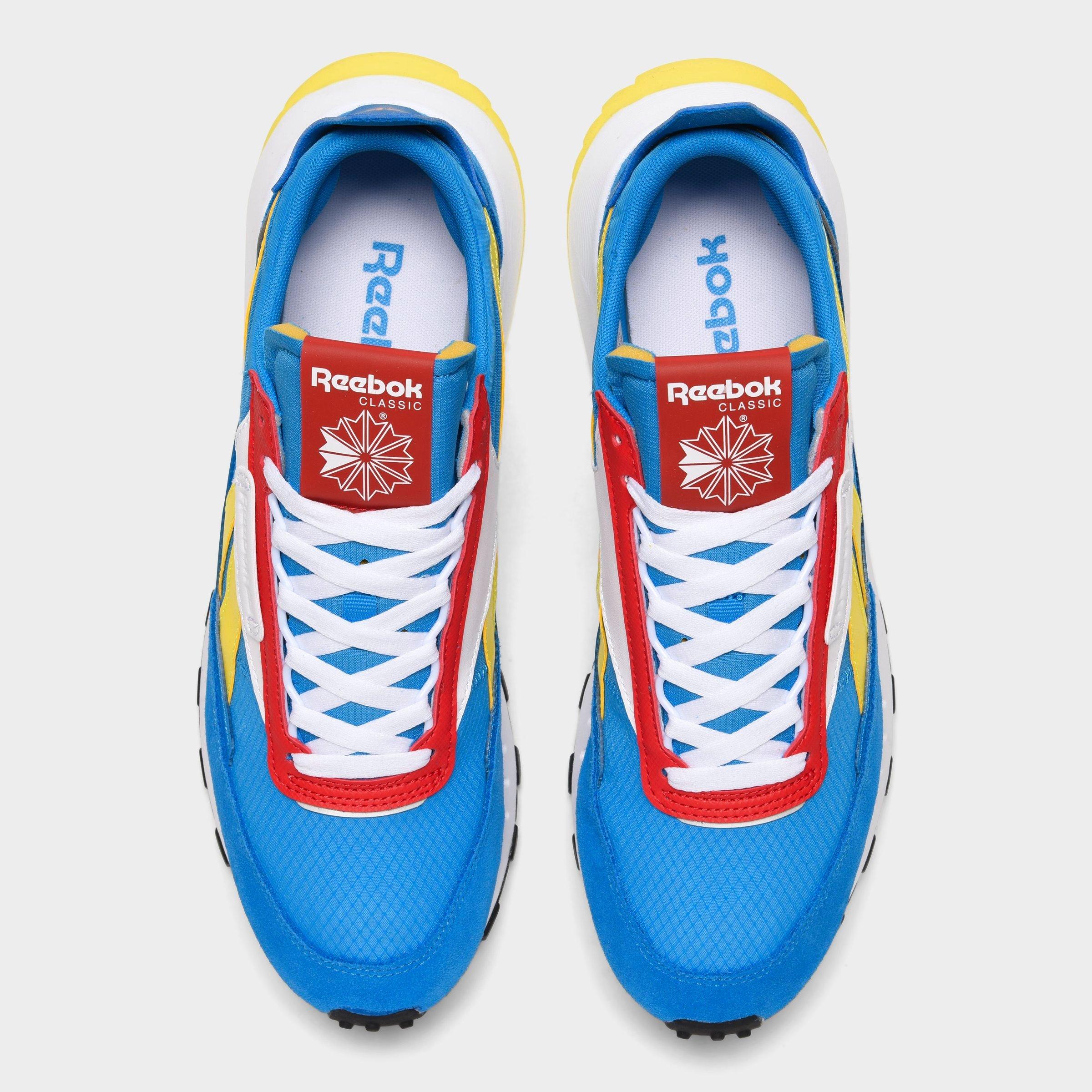 blue and yellow reebok classic