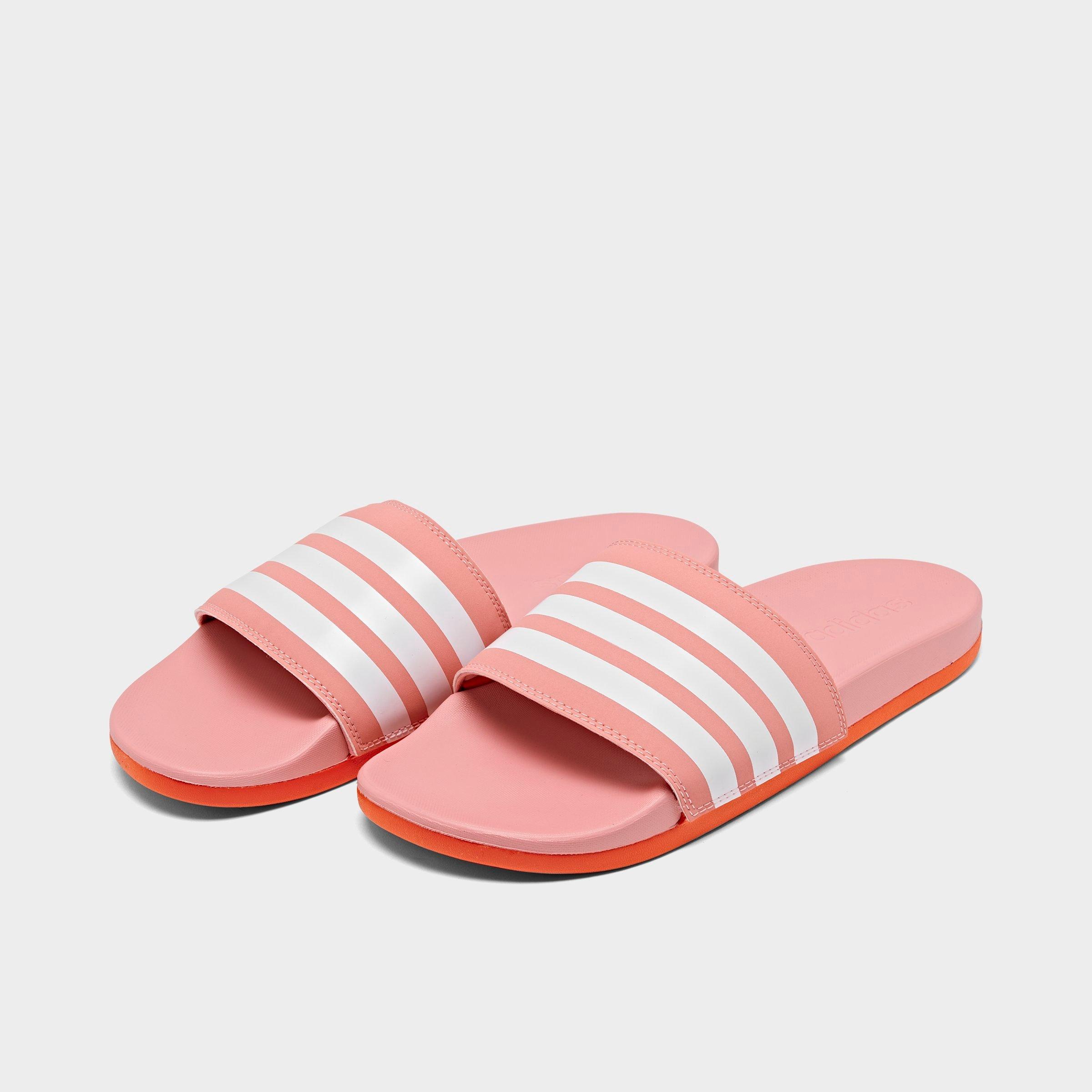 white and pink adidas slides