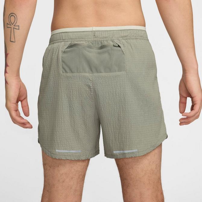 [angle] view of Men's Nike Stride Running Division Dri-FIT Seersucker 5" Brief-Lined Shorts in Dark Stucco/Light Bone Click to zoom