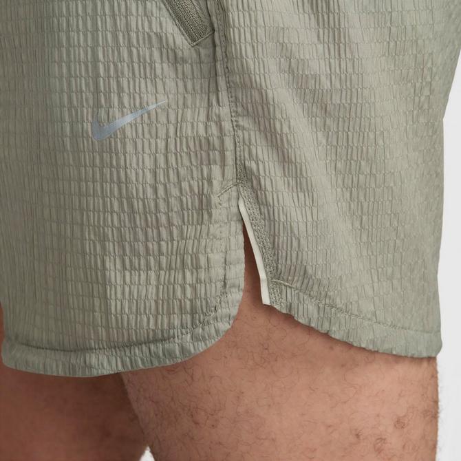 [angle] view of Men's Nike Stride Running Division Dri-FIT Seersucker 5" Brief-Lined Shorts in Dark Stucco/Light Bone Click to zoom