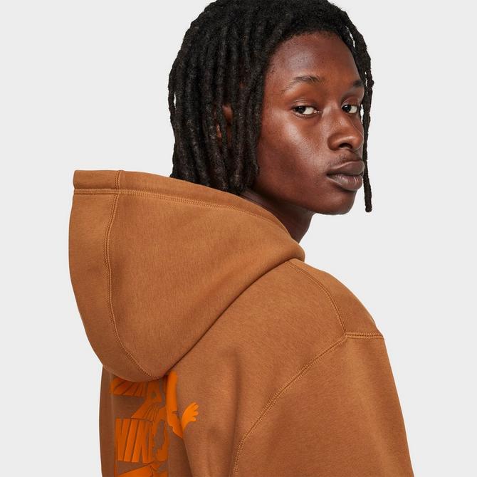 [angle] view of Men's Nike Sportswear Club Victory Graphic Hoodie in Light British Tan/Light British Tan/Safety Orange Click to zoom