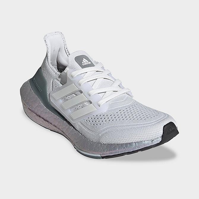 Three Quarter view of Girls' Big Kids' adidas UltraBOOST 21 Running Shoes in Crystal White/Crystal White/Hazy Green Click to zoom