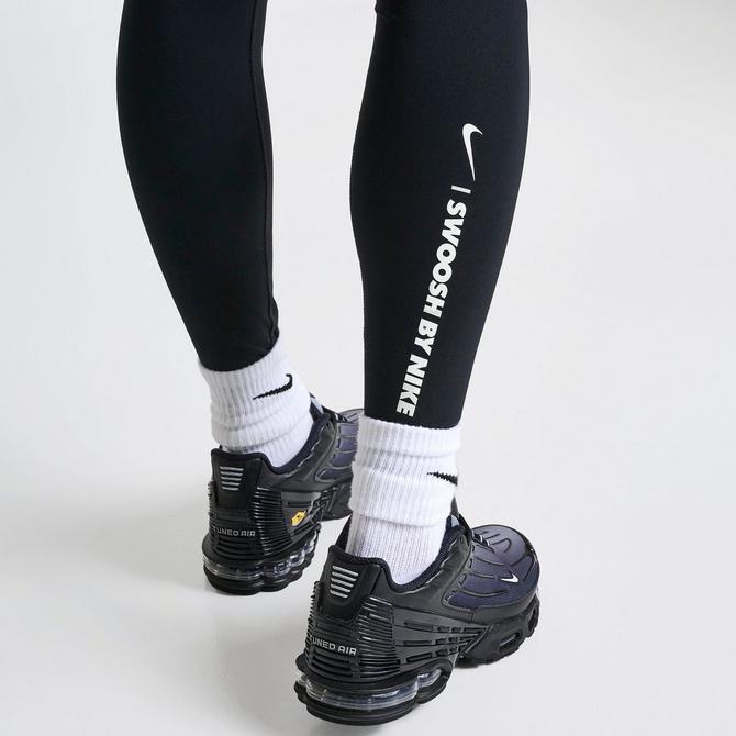 Nike leggings with nike across legs best sale