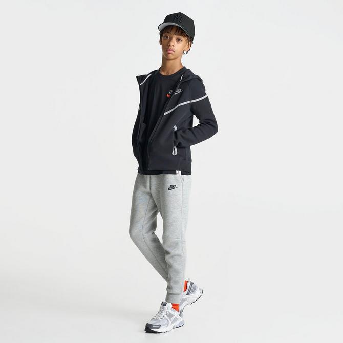 [angle] view of Boys' Big Kids' Nike Sportswear Tech Fleece Reflective Full-Zip Hoodie in Black/Silver Click to zoom
