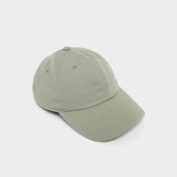Left view of Nike Club Small Swoosh Unstructured Strapback Hat in Light Army/Sail Click to zoom