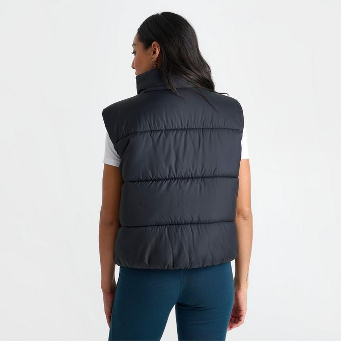 [angle] view of Women's Nike Therma-FIT Loose Classic Puffer Vest in Black Click to zoom