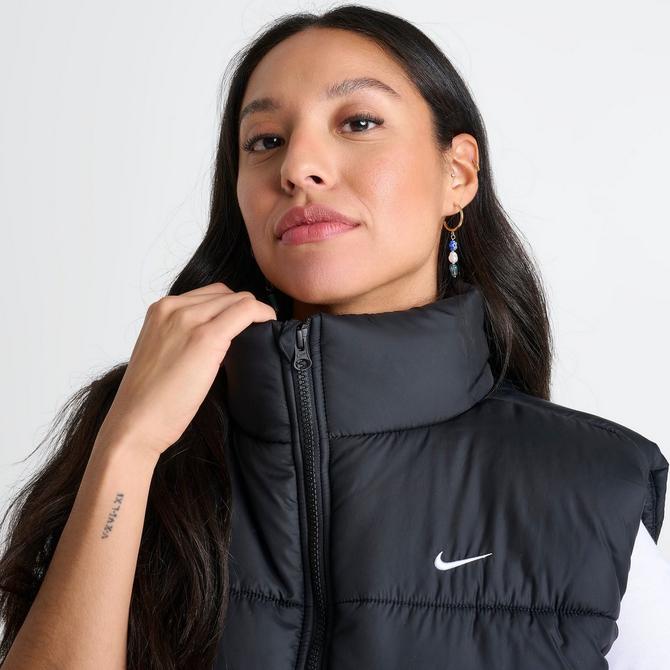 [angle] view of Women's Nike Therma-FIT Loose Classic Puffer Vest in Black Click to zoom