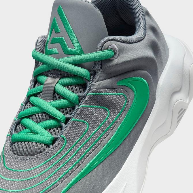 Front view of Big Kids’ Nike Giannis Immortality 4 Basketball Shoes in Smoke Grey/Stadium Green/Wolf Grey/Dark Smoke Click to zoom
