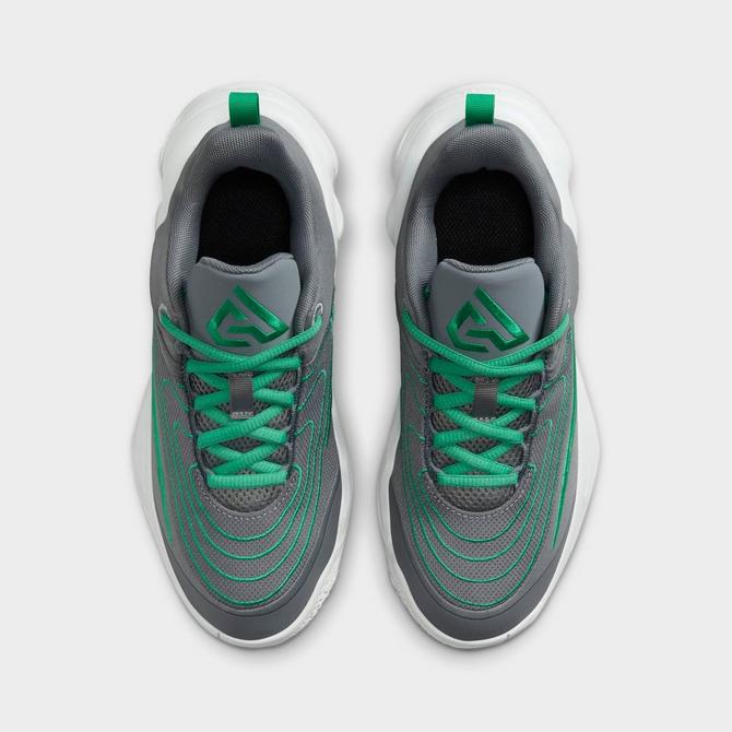 Back view of Big Kids’ Nike Giannis Immortality 4 Basketball Shoes in Smoke Grey/Stadium Green/Wolf Grey/Dark Smoke Click to zoom