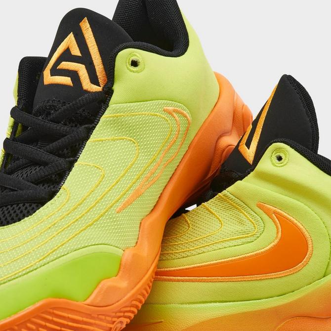 Front view of Big Kids’ Nike Giannis Immortality 4 Basketball Shoes in Cyber/Bright Mandarin/Sundial/Lightning Click to zoom