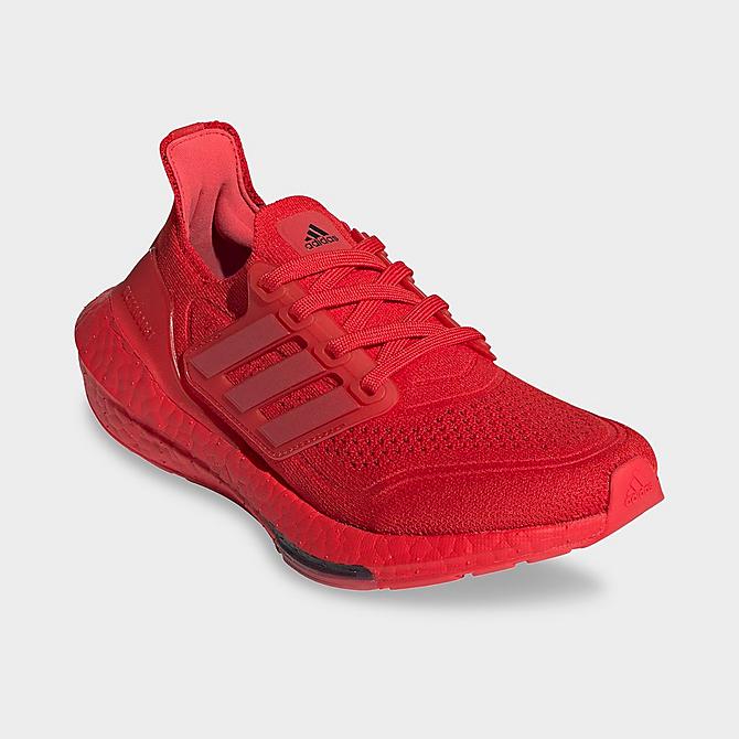 Three Quarter view of Boys' Big Kids' adidas UltraBOOST 21 Primeblue Running Shoes in Vivid Red/Vivid Red/Black Click to zoom