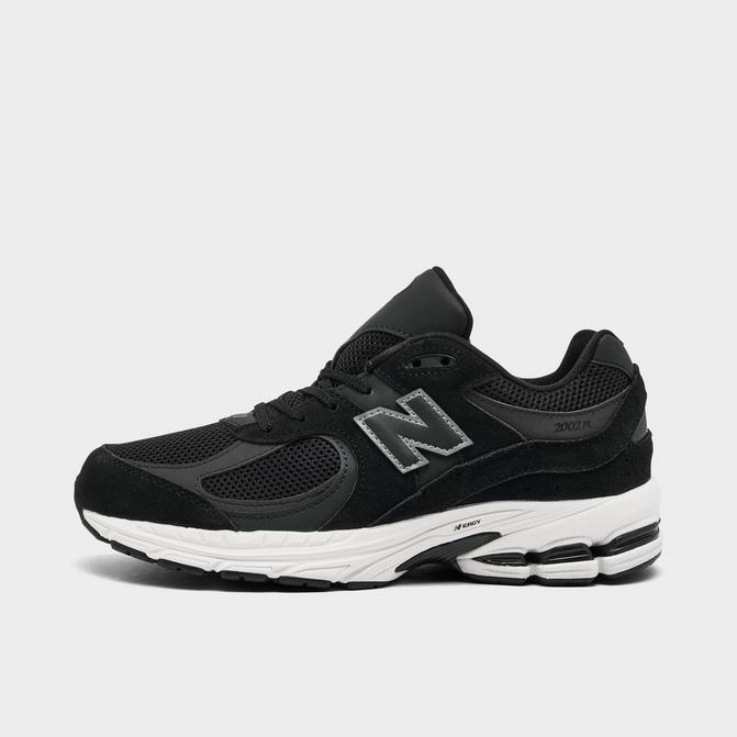 Kids black new balance shoes on sale