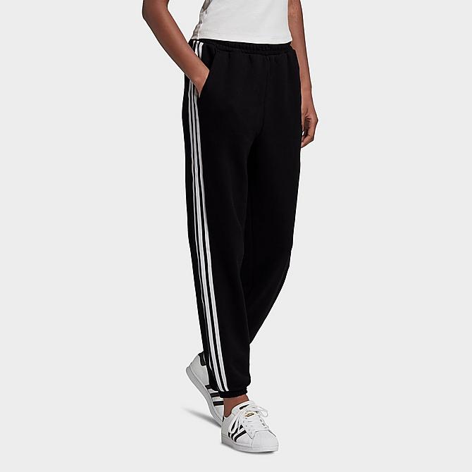 Front Three Quarter view of Women's adidas Originals Regular Jogger Pants in Black/White Click to zoom
