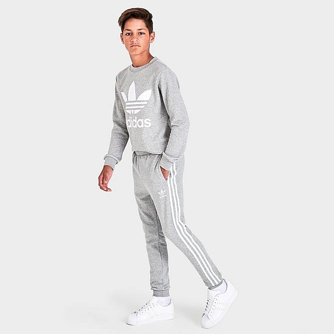 Front Three Quarter view of Kids' adidas Originals 3-Stripes Jogger Pants in Medium Grey Heather/White Click to zoom