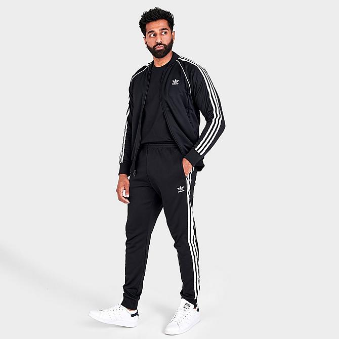 Front Three Quarter view of Men's adidas Classics Adicolor Primeblue SST Track Pants in Black/White Click to zoom