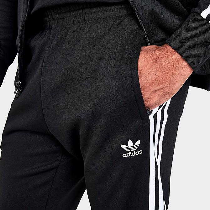 On Model 5 view of Men's adidas Classics Adicolor Primeblue SST Track Pants in Black/White Click to zoom