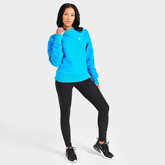 Front Three Quarter view of Women's Champion Reverse Weave Crewneck Sweatshirt in Blue Click to zoom