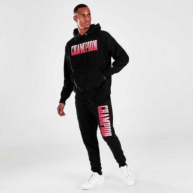 Front Three Quarter view of Men's Champion Reverse Weave Graphic Print Pullover Hoodie in Black Click to zoom