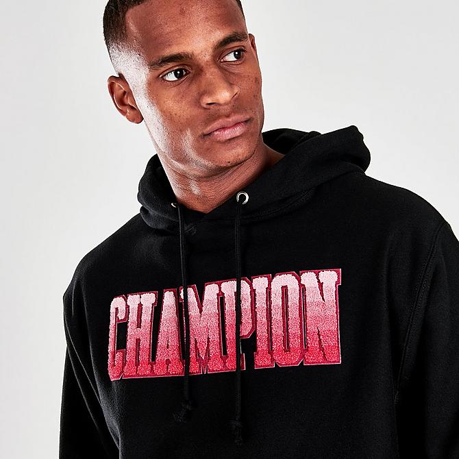 On Model 5 view of Men's Champion Reverse Weave Graphic Print Pullover Hoodie in Black Click to zoom
