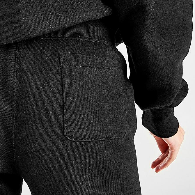 On Model 5 view of Women's Champion Reverse Weave Jogger Sweatpants in Black Click to zoom