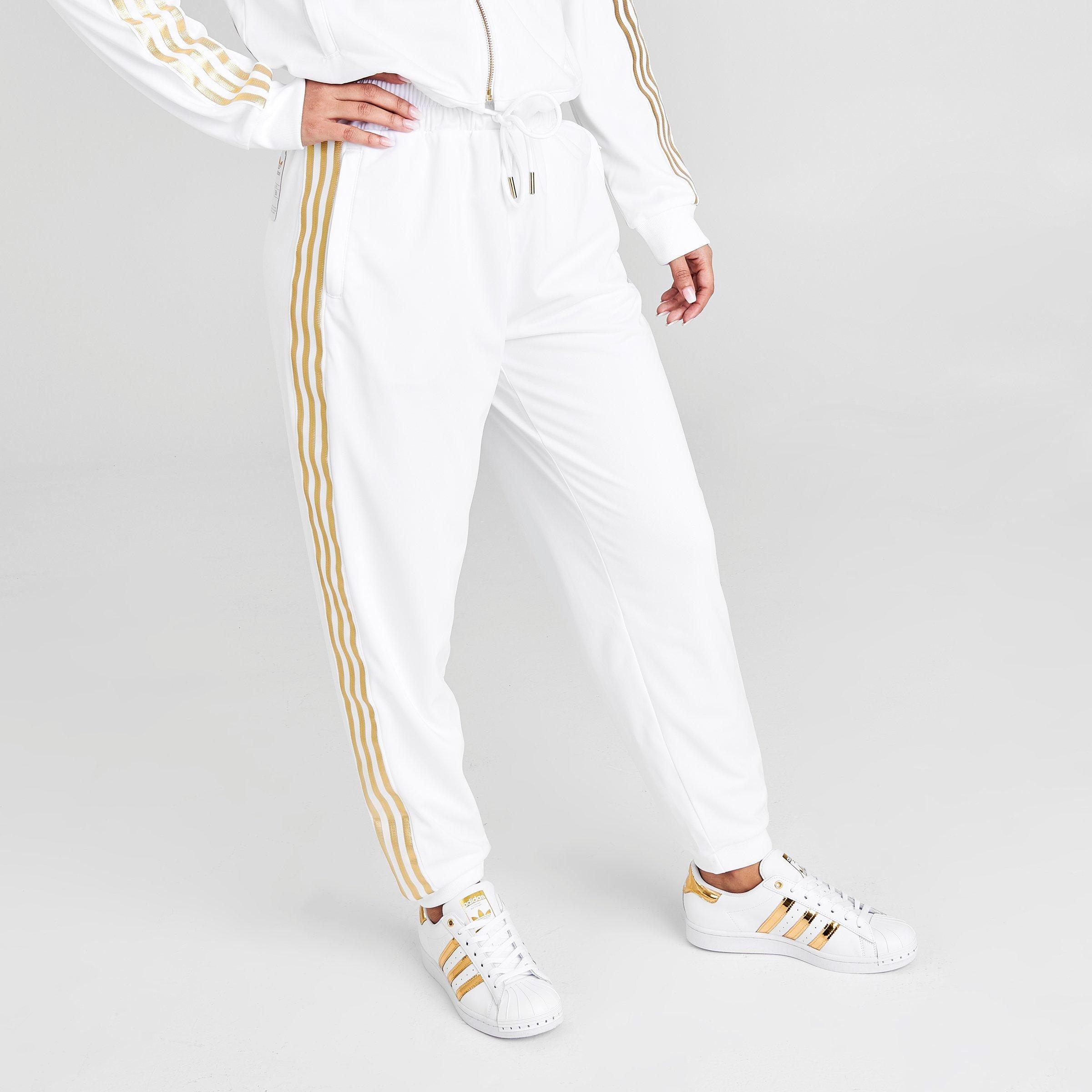 white and gold adidas sweatpants